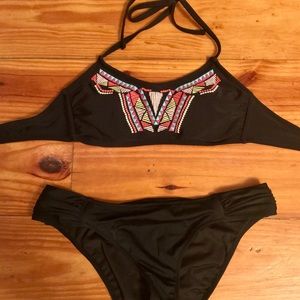 Black bikini top and bottoms. Hippie design.